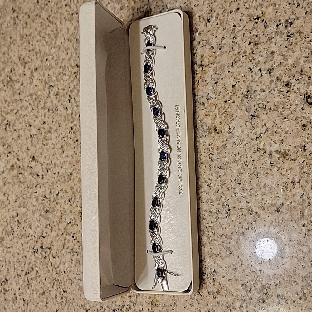 EUC diamond and sterling silver bracelet with blue stones